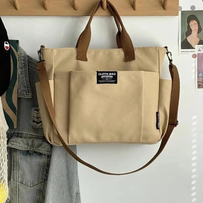 Bolsa Tote Feminina de Lona – Estilo Urbano Minimalista, Grande Capacidade e Alça Transversal, Ideal para Trabalho e Faculdade